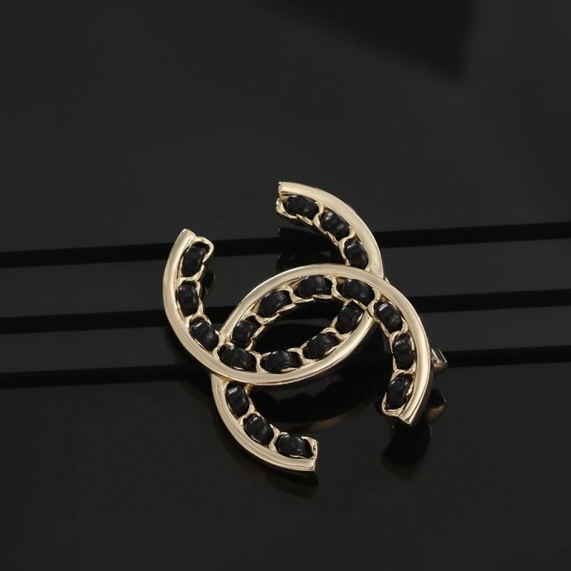Ch**el brooches